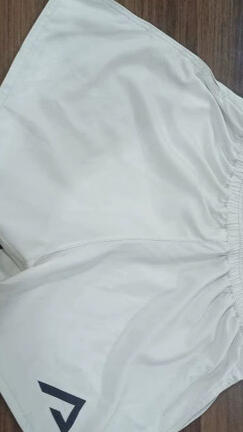 Cream / white shorts / from $44